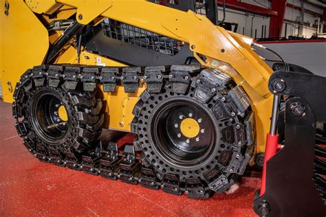 installing tracks on skid steer